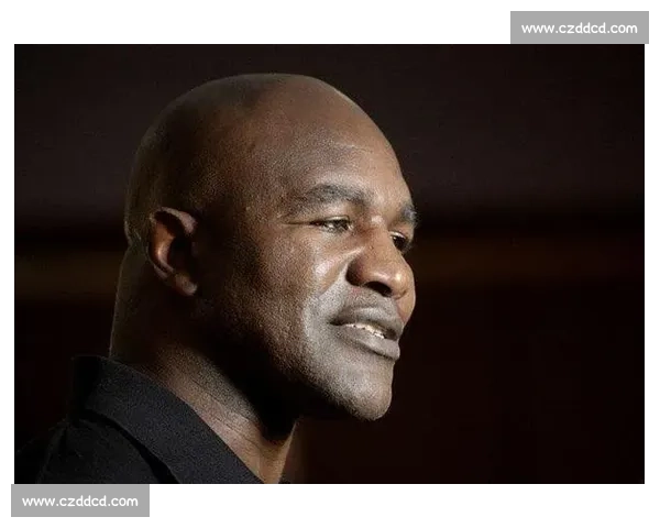 世纪重拳对决福尔曼与刘易斯的力量巅峰与时代回响拳坛传奇之战